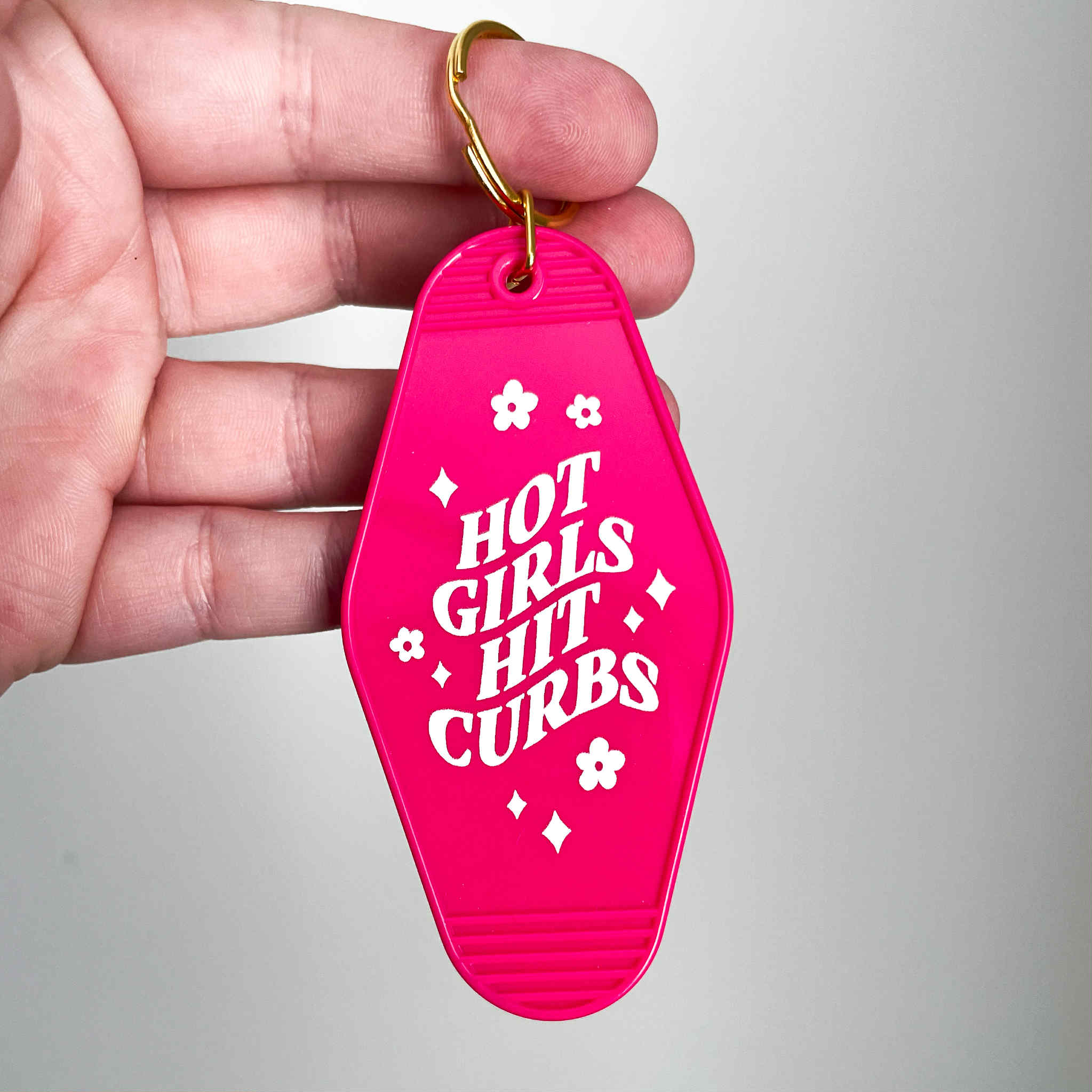 HOT GIRLS HIT CURBS MOTEL KEYCHAIN (PINK)