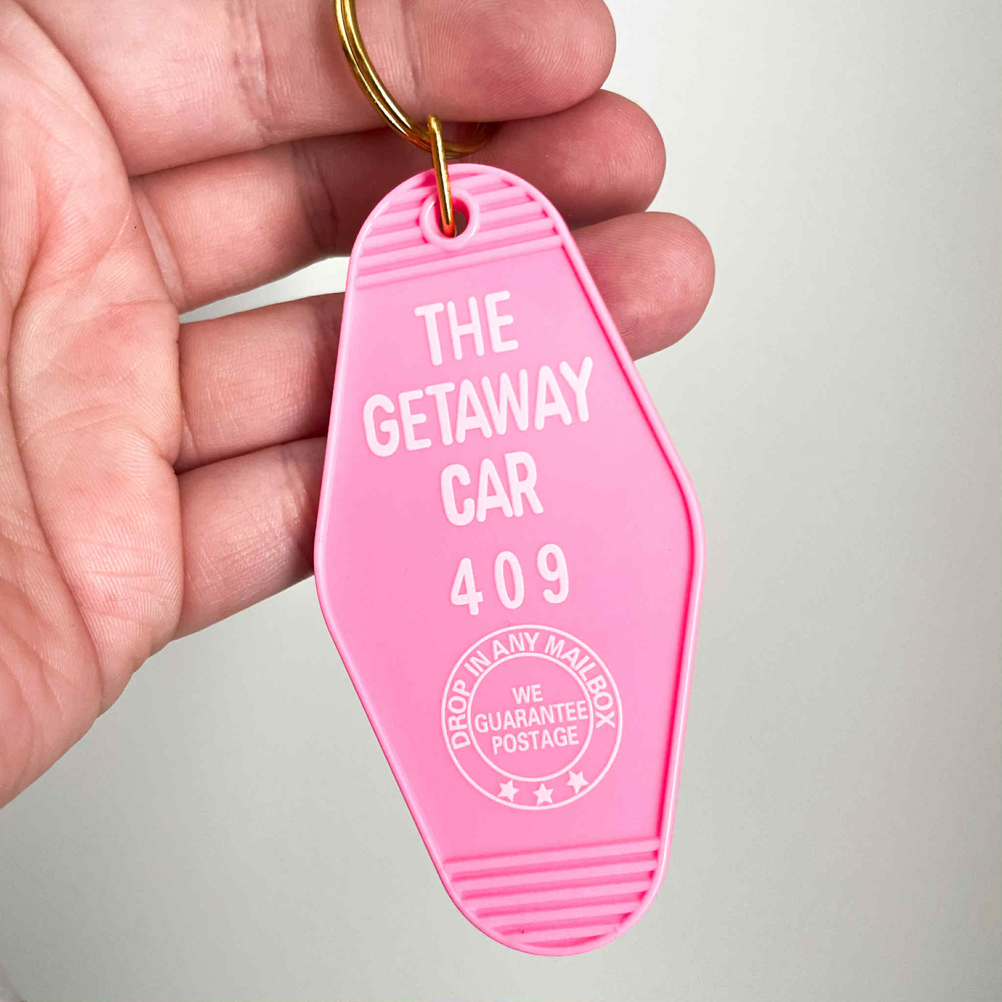 GETAWAY CAR MOTEL KEYCHAIN
