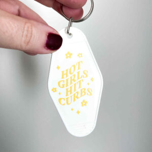 HOT GIRLS HIT CURBS MOTEL KEYCHAIN (WHITE)
