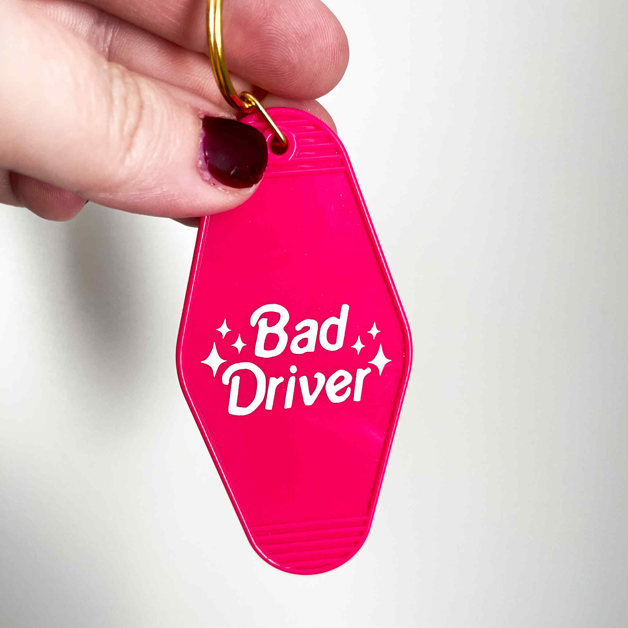 BAD DRIVER MOTEL KEYCHAIN