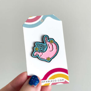 VICTIMIZED BY MY TUMMY ENAMEL PIN