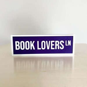 BOOK LOVERS BOOKSHELF SIGN PURPLE