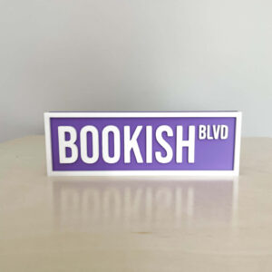 BOOKISH BOOKSHELF SIGN LIGHT PURPLE