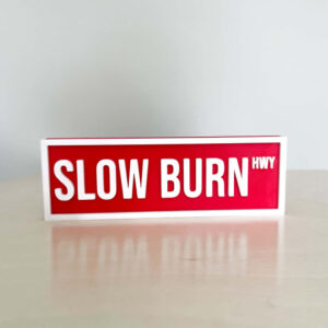 SLOW BURN BOOKSHELF SIGN