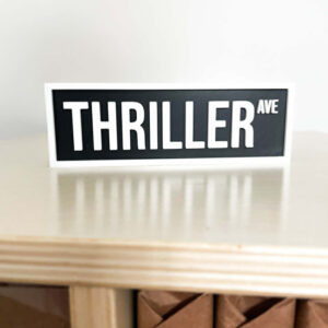 THRILLER BOOKSHELF SIGN