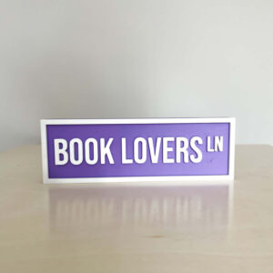 BOOK LOVERS BOOKSHELF SIGN LIGHT PURPLE